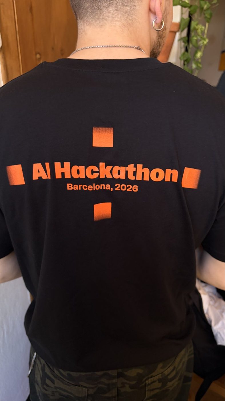 The back of the black T-shirt with the orange AI Hackathon print