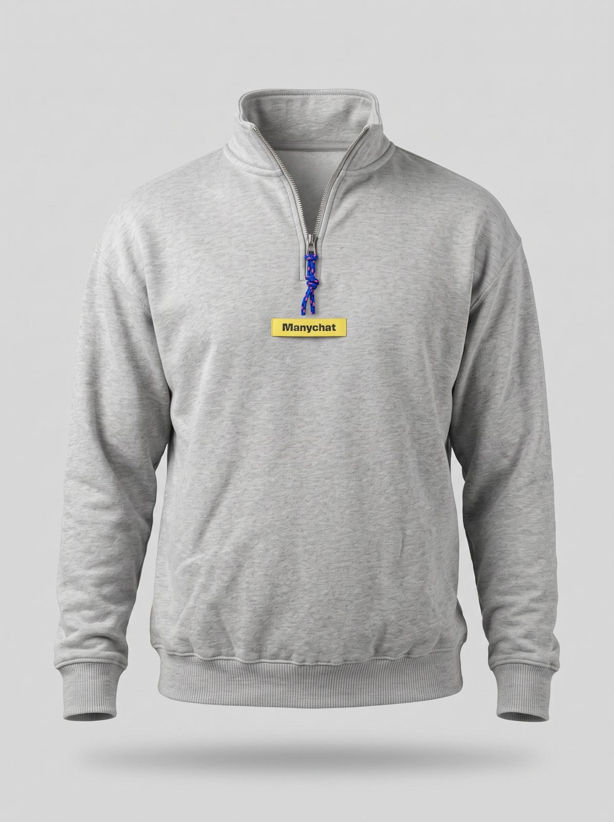 The heather grey quarter-zip sweatshirt with the yellow woven label and the blue paracord zip pull