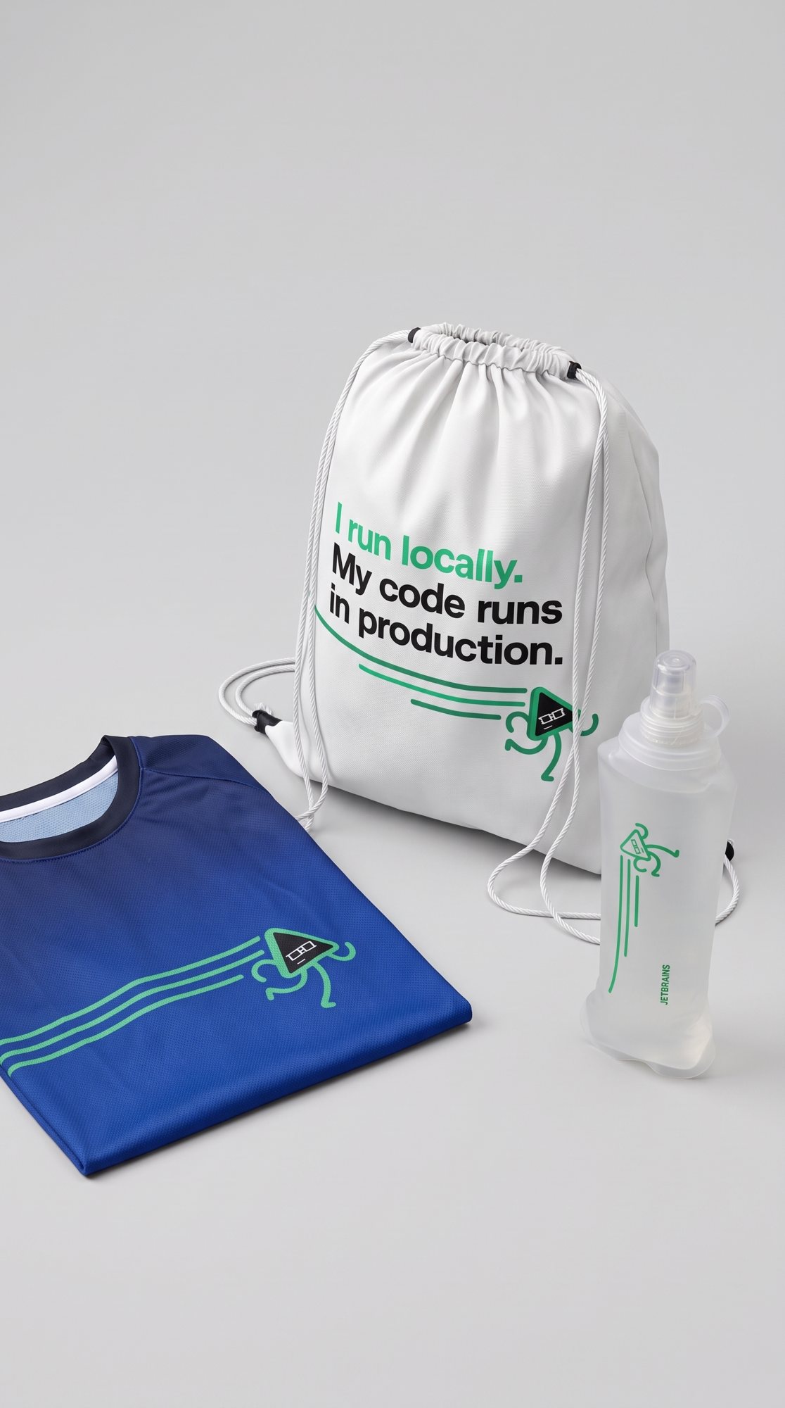The folded tee, the bag and the flask together in the studio