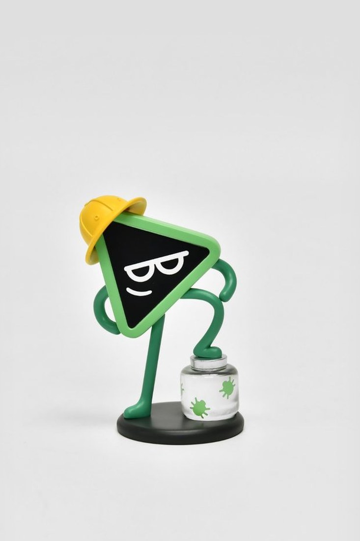 Runzo in a yellow hard hat with a jar of green bugs