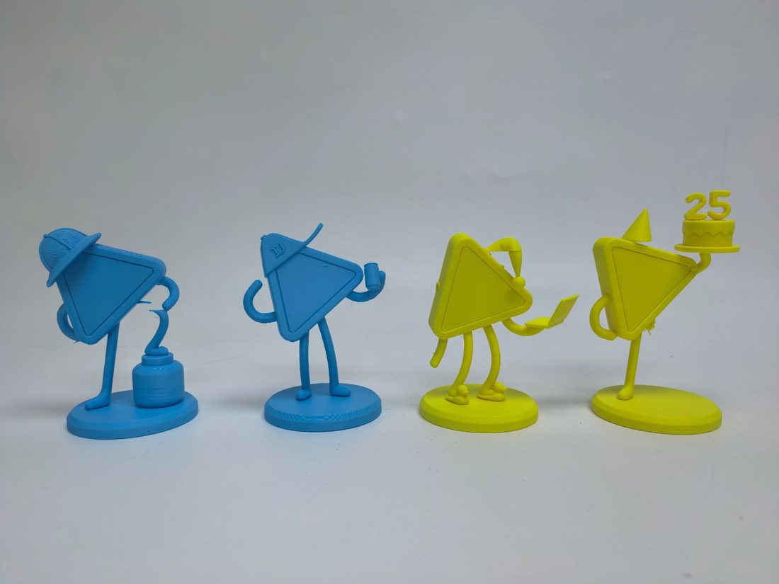 Blue and yellow test prints of all four figures