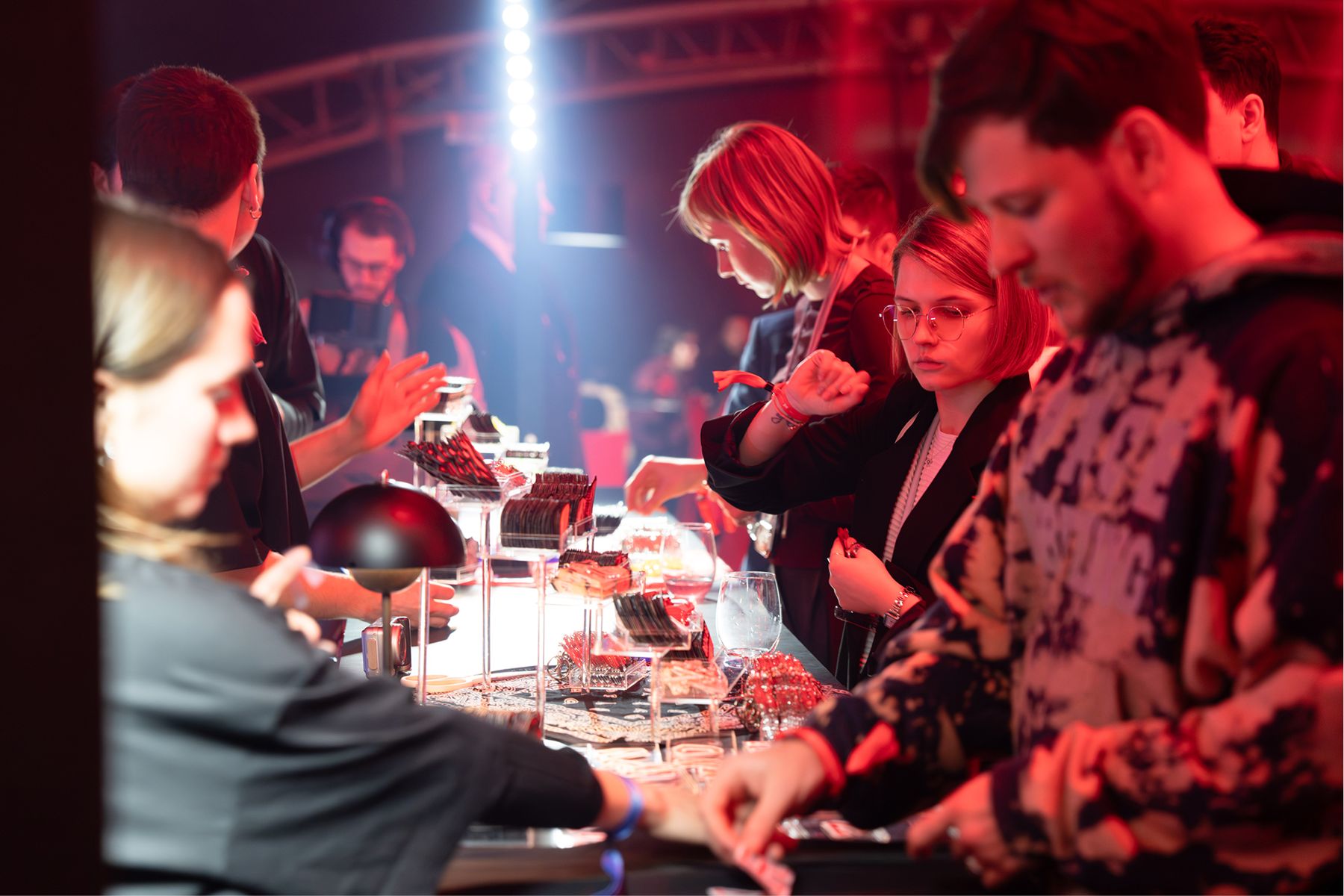 Guests choosing patches at the bar
