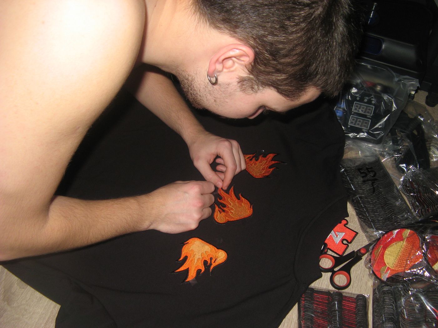 Placing flame patches on a black tee during the test run