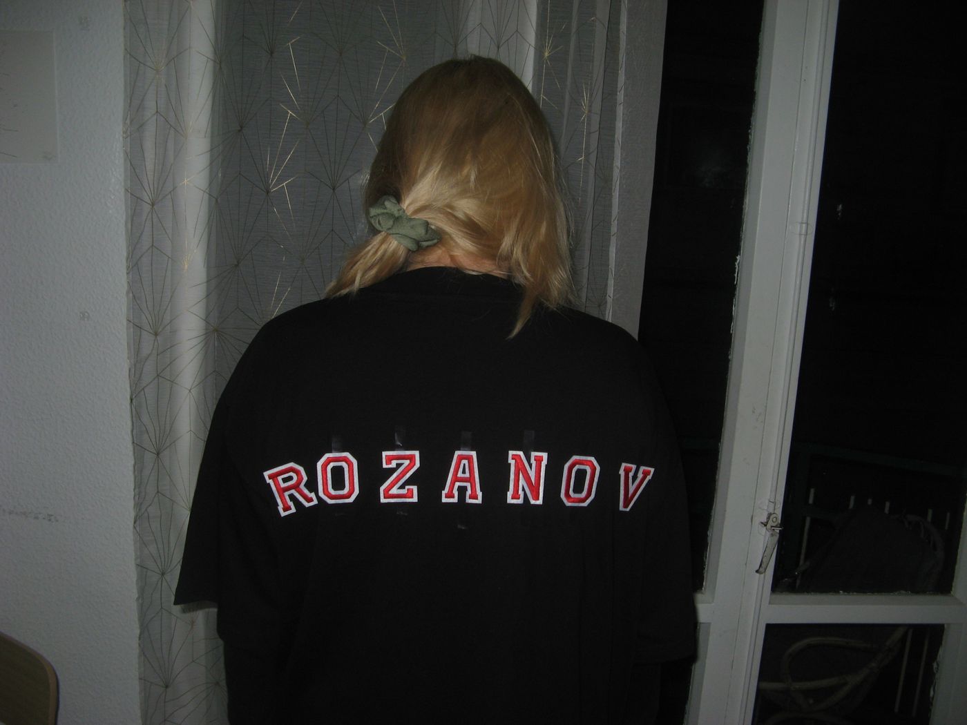 The back of a tee lettered ROZANOV