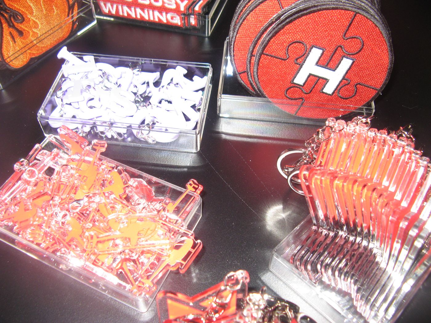 Acrylic letter charms and puzzle patches in clear trays