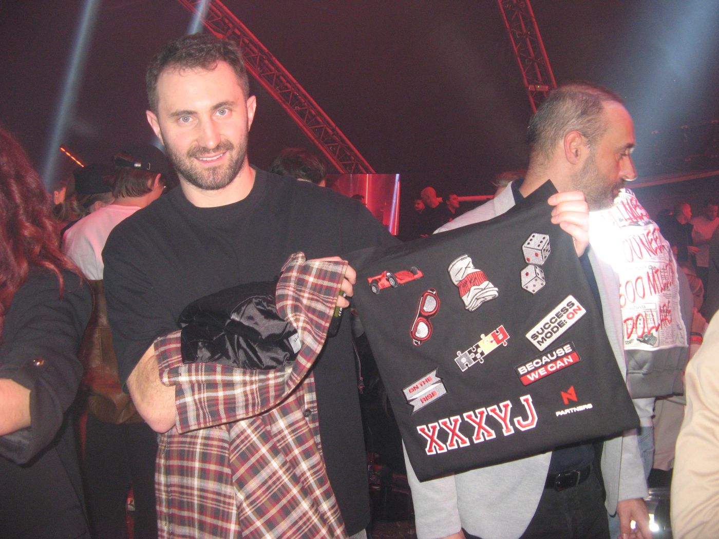 A guest with a tote full of patches